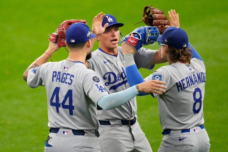 Dodgers survive late rally to win MLB playoff opener